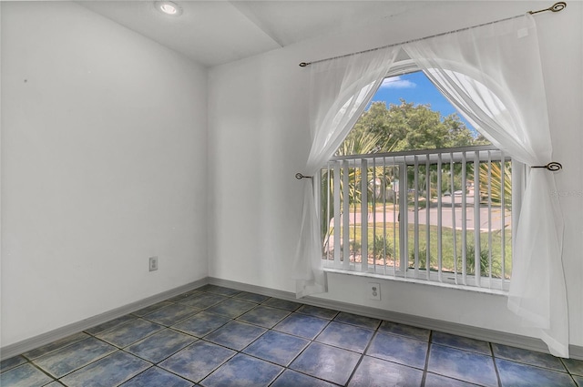 485 Whittingham Pl, Lake Mary, FL 32746 - unfurnished room featuring plenty of natural light, vaulted ceiling, and tile patterned floors