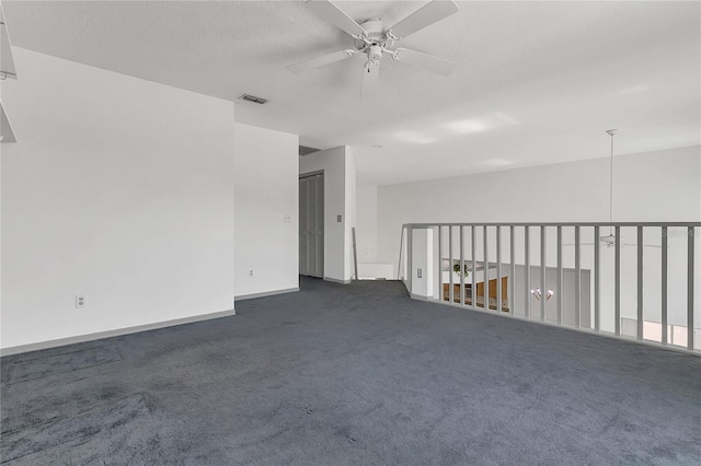 485 Whittingham Pl, Lake Mary, FL 32746 - spare room with ceiling fan and dark carpet