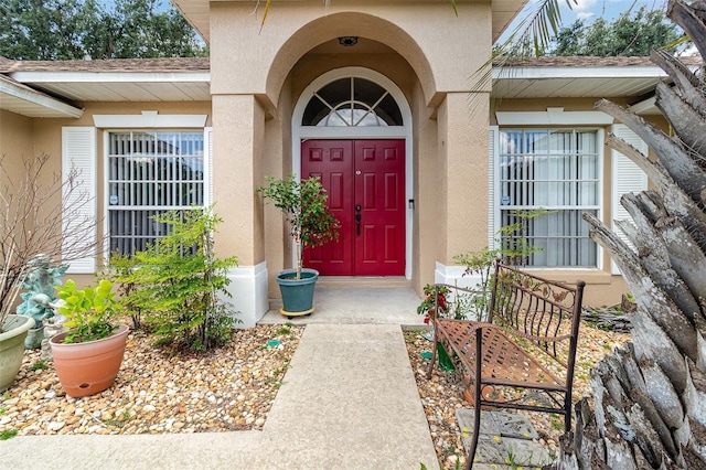 11512 Clair Pl, Clermont, FL 34711 - doorway to property with stucco siding and roof with shingles