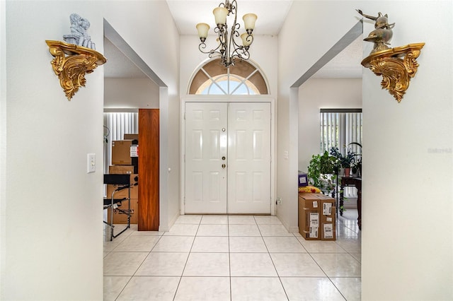 11512 Clair Pl, Clermont, FL 34711 - foyer featuring a chandelier and light tile patterned floors