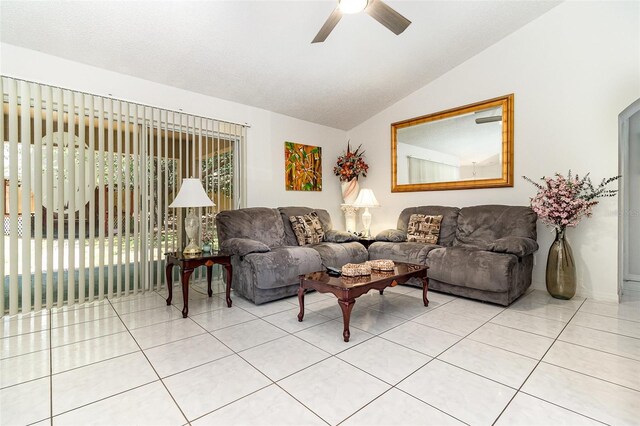 11512 Clair Pl, Clermont, FL 34711 - living room featuring lofted ceiling, a ceiling fan, and light tile patterned flooring