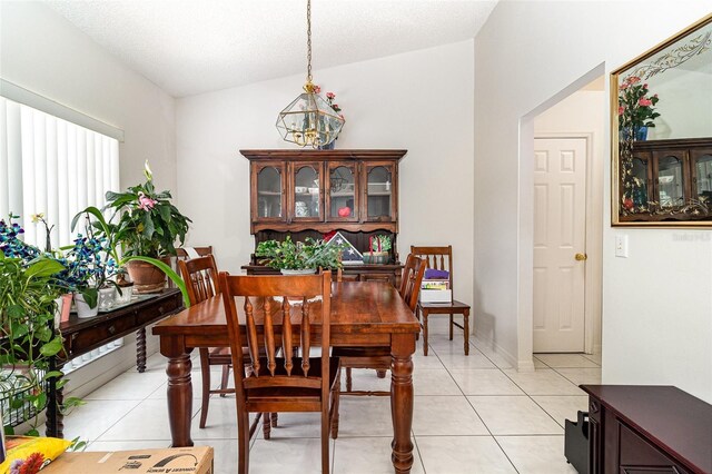 11512 Clair Pl, Clermont, FL 34711 - dining space with light tile patterned flooring and a chandelier