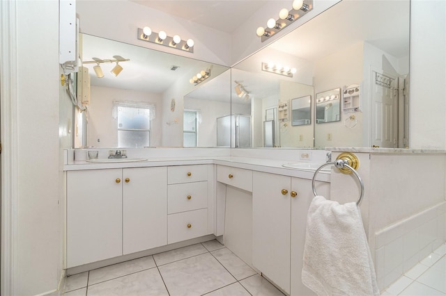 11512 Clair Pl, Clermont, FL 34711 - full bathroom with double vanity and tile patterned floors