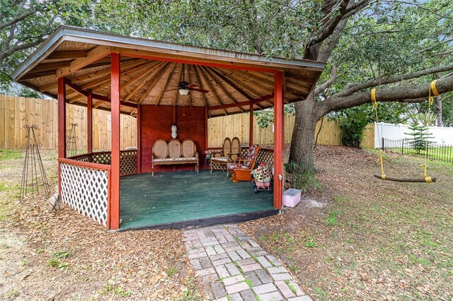 11512 Clair Pl, Clermont, FL 34711 - deck featuring a gazebo, a fenced backyard, and a ceiling fan