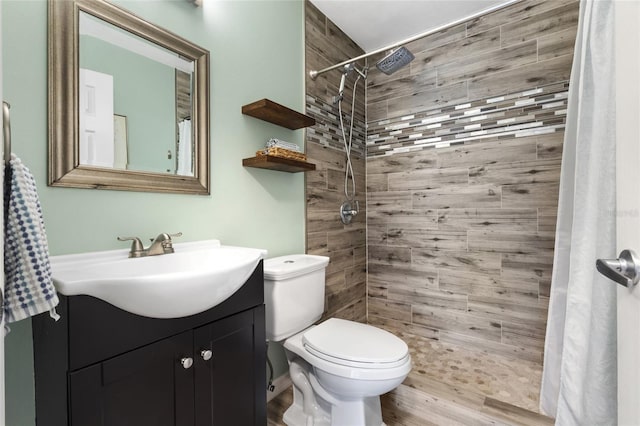 1616 Golden Poppy Ct, Orlando, FL 32824 - bathroom with vanity, toilet, and a tile shower