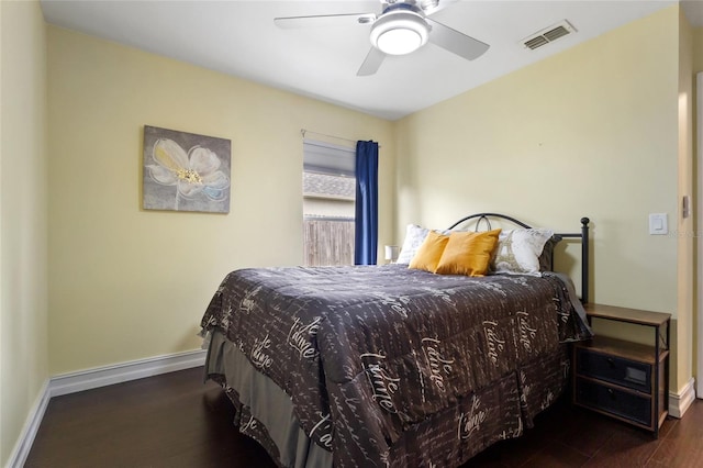 1616 Golden Poppy Ct, Orlando, FL 32824 - bedroom with wood finished floors, baseboards, and ceiling fan