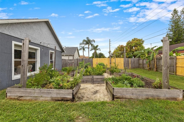 1616 Golden Poppy Ct, Orlando, FL 32824 - view of yard with a vegetable garden