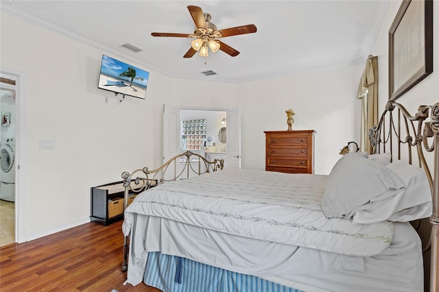 41128 Apple St, Eustis, FL 32736 - bedroom featuring washer / dryer, ornamental molding, wood finished floors, baseboards, and ceiling fan