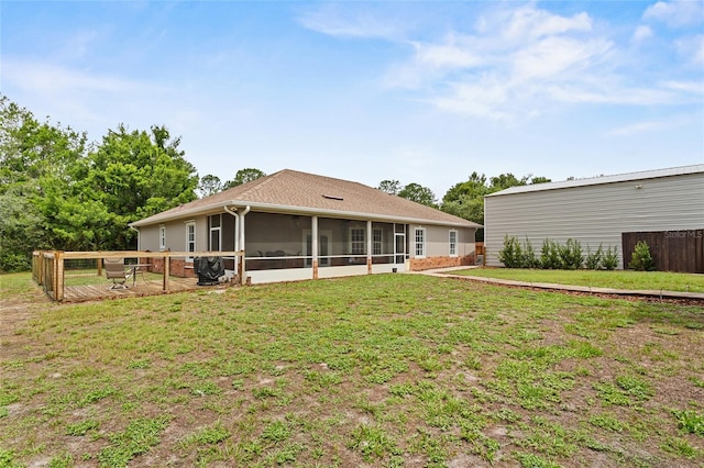 41128 Apple St, Eustis, FL 32736 - rear view of house with a sunroom