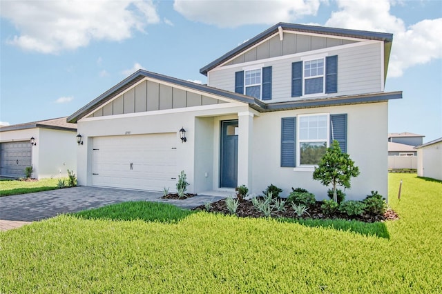 1740 Brekey Way, Zephyrhills, FL 33541 - view of front of property with board and batten siding, a garage, a front yard, and decorative driveway