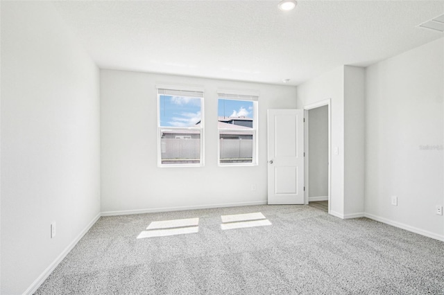 1740 Brekey Way, Zephyrhills, FL 33541 - carpeted spare room with baseboards