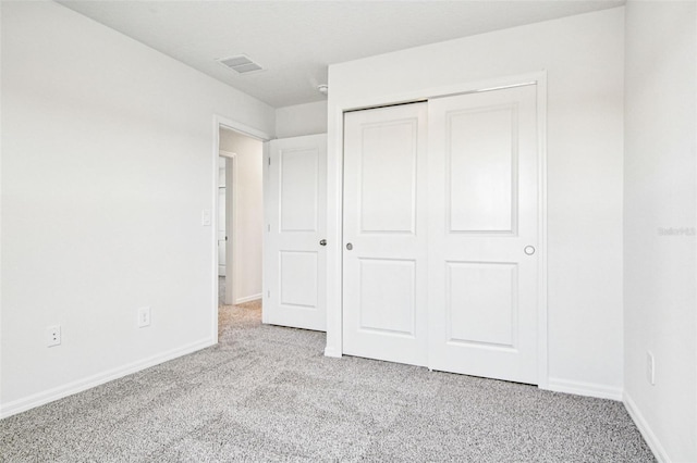 1740 Brekey Way, Zephyrhills, FL 33541 - unfurnished bedroom featuring carpet and a closet