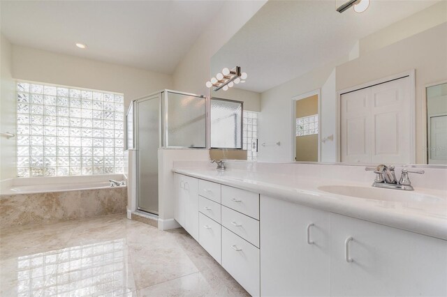6121 Oxbow Bend Ln, Port Orange, FL 32128 - bathroom featuring double vanity, a bath, a shower stall, tile patterned floors, and recessed lighting