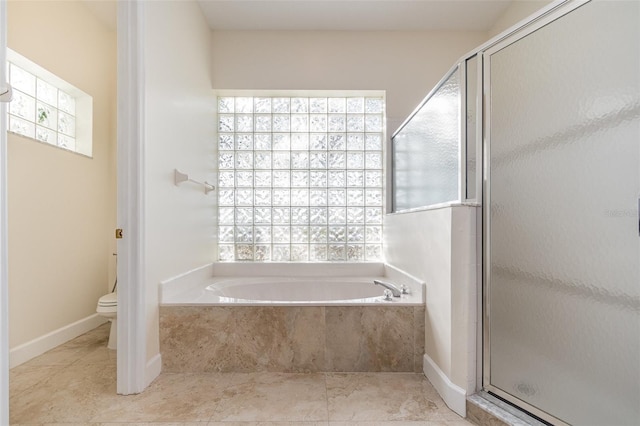 6121 Oxbow Bend Ln, Port Orange, FL 32128 - full bath with a bath, toilet, a shower stall, and plenty of natural light