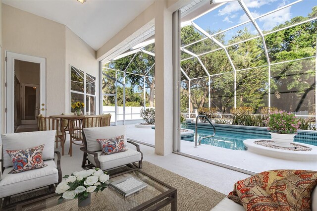 6121 Oxbow Bend Ln, Port Orange, FL 32128 - sunroom / solarium featuring an outdoor hangout area and vaulted ceiling