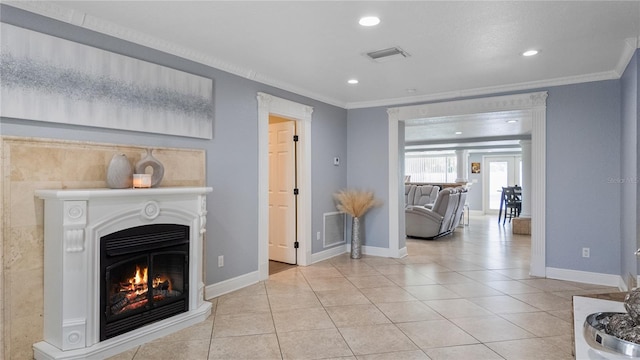 2110 W Farwell Dr, Tampa, FL 33603 - living area with ornamental molding, light tile patterned flooring, baseboards, recessed lighting, and a lit fireplace