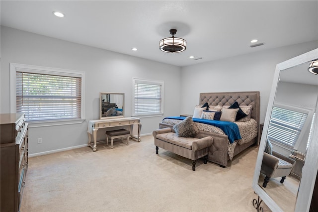 2110 W Farwell Dr, Tampa, FL 33603 - bedroom with light colored carpet, recessed lighting, and baseboards