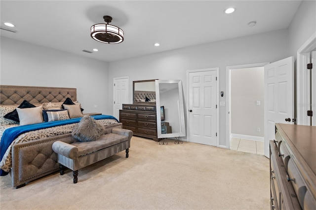 2110 W Farwell Dr, Tampa, FL 33603 - bedroom featuring light carpet, recessed lighting, light tile patterned floors, and baseboards