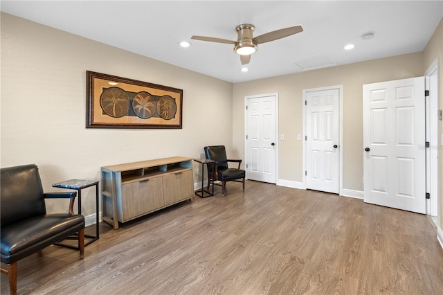 2110 W Farwell Dr, Tampa, FL 33603 - sitting room featuring light wood-style flooring, baseboards, attic access, a ceiling fan, and recessed lighting