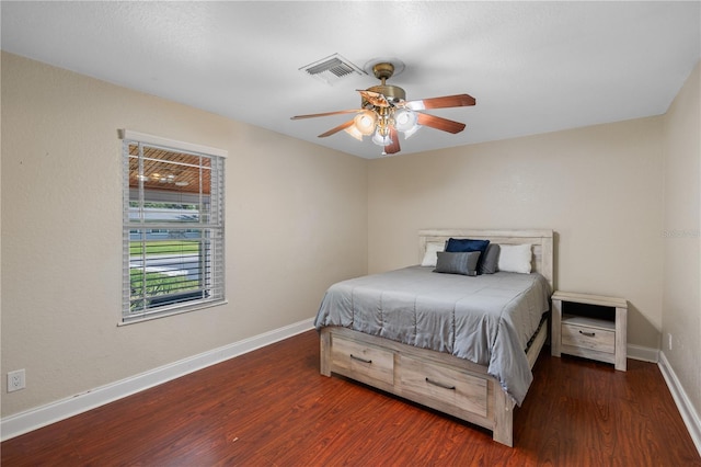 2110 W Farwell Dr, Tampa, FL 33603 - bedroom with wood finished floors, baseboards, and ceiling fan