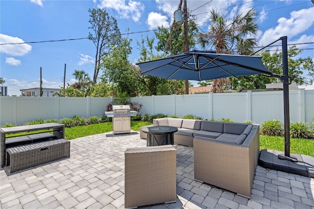 2110 W Farwell Dr, Tampa, FL 33603 - fenced backyard with an outdoor living space, a patio area, and area for grilling