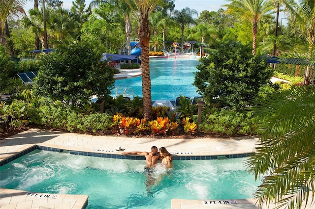 15695 Grove Resort Ave Unit 4438, Winter Garden, FL 34787 - outdoor pool with an in-ground hot tub