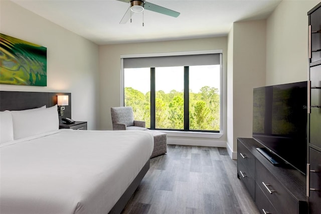 15695 Grove Resort Ave Unit 4438, Winter Garden, FL 34787 - bedroom featuring dark wood finished floors and ceiling fan