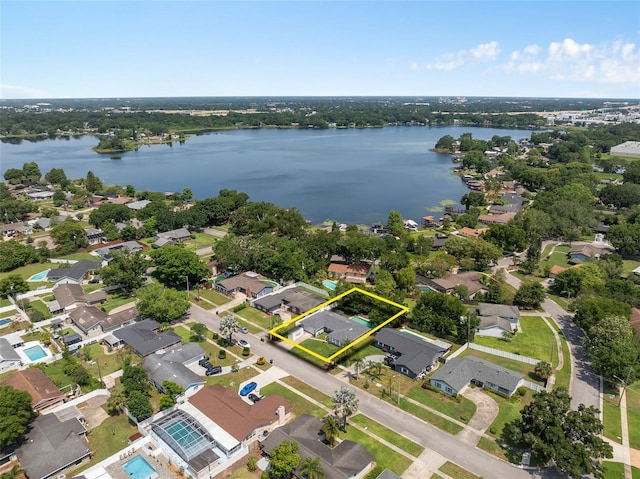 217 Spencer St, Orlando, FL 32839 - aerial view of residential area with property boundaries highlighted and a nearby body of water