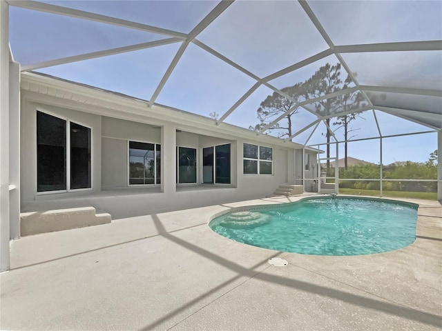13210 Essman Ave, Port Charlotte, FL 33953 - swimming pool featuring a patio and glass enclosure