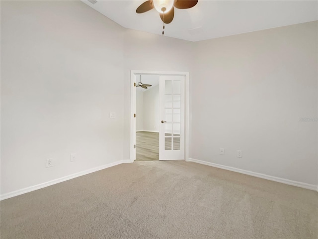 13210 Essman Ave, Port Charlotte, FL 33953 - unfurnished room featuring ceiling fan, carpet floors, baseboards, and french doors