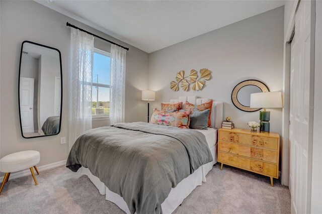 1323 Normandy Dr, Haines City, FL 33844 - carpeted bedroom featuring baseboards