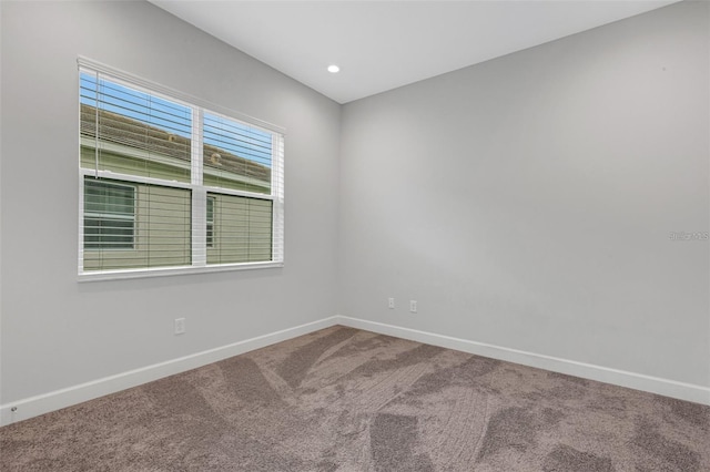 32740 Tree Of Life Ave, Wesley Chapel, FL 33543 - empty room with carpet floors, baseboards, and recessed lighting