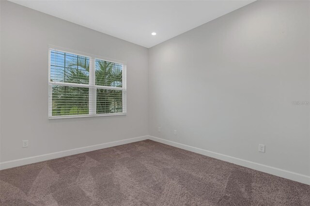 32740 Tree Of Life Ave, Wesley Chapel, FL 33543 - carpeted spare room featuring baseboards and recessed lighting