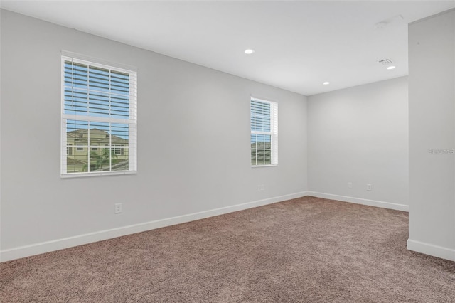 32740 Tree Of Life Ave, Wesley Chapel, FL 33543 - unfurnished room with carpet floors, baseboards, and recessed lighting