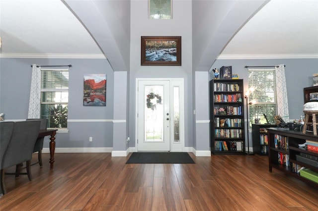 319 Morning View Dr, Winter Garden, FL 34787 - entrance foyer featuring wood finished floors, arched walkways, and ornamental molding
