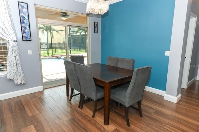 319 Morning View Dr, Winter Garden, FL 34787 - dining space featuring wood finished floors, a ceiling fan, and a chandelier
