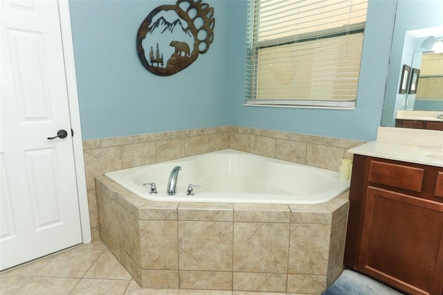 319 Morning View Dr, Winter Garden, FL 34787 - full bathroom featuring vanity, a garden tub, and tile patterned flooring