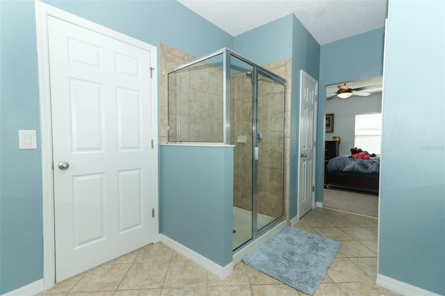 319 Morning View Dr, Winter Garden, FL 34787 - ensuite bathroom featuring a stall shower, tile patterned floors, and a ceiling fan