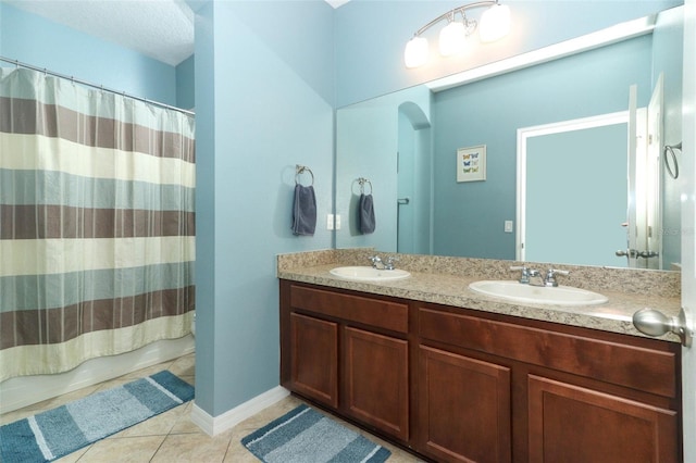 319 Morning View Dr, Winter Garden, FL 34787 - full bathroom featuring double vanity and tile patterned flooring