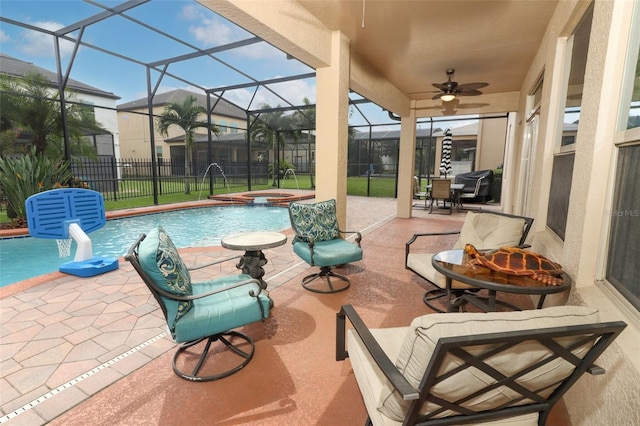 319 Morning View Dr, Winter Garden, FL 34787 - fenced backyard with ceiling fan, a pool with connected hot tub, a patio, and a lanai