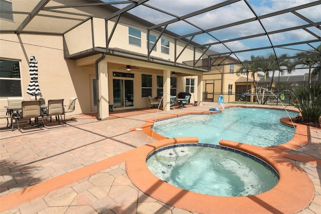 319 Morning View Dr, Winter Garden, FL 34787 - view of pool with a patio, a ceiling fan, a pool with connected hot tub, and outdoor dining space
