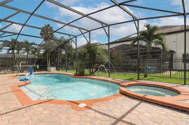 319 Morning View Dr, Winter Garden, FL 34787 - view of pool featuring glass enclosure, a patio, and a pool with connected hot tub