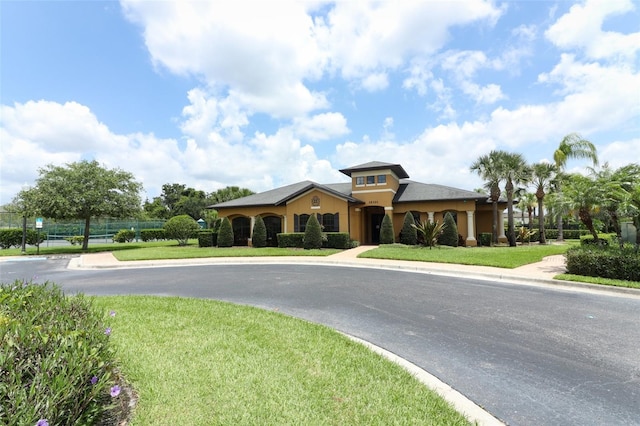 319 Morning View Dr, Winter Garden, FL 34787 - view of front of property with stucco siding and a front lawn