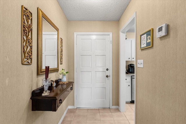 1146 Villa Ln Unit 101, Apopka, FL 32712 - entrance foyer featuring light tile patterned floors and a textured ceiling