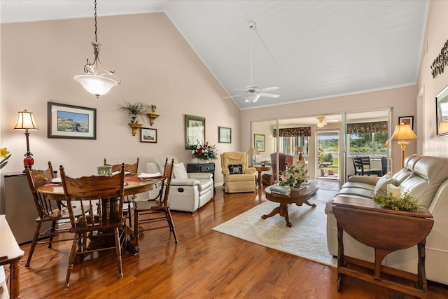 1146 Villa Ln Unit 101, Apopka, FL 32712 - living room featuring a ceiling fan, crown molding, wood finished floors, and high vaulted ceiling
