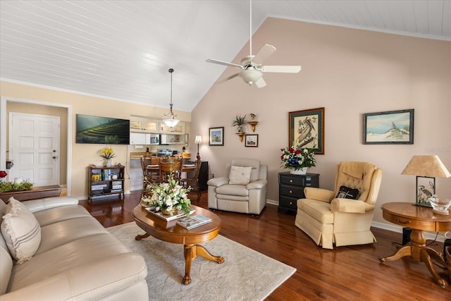 1146 Villa Ln Unit 101, Apopka, FL 32712 - living area featuring dark wood-type flooring, a ceiling fan, high vaulted ceiling, and baseboards