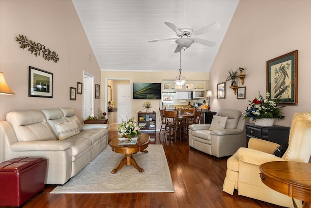 1146 Villa Ln Unit 101, Apopka, FL 32712 - living area featuring high vaulted ceiling, a ceiling fan, and dark wood-style floors
