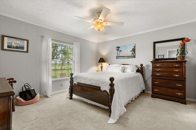 1146 Villa Ln Unit 101, Apopka, FL 32712 - bedroom featuring light colored carpet, a textured ceiling, crown molding, baseboards, and ceiling fan