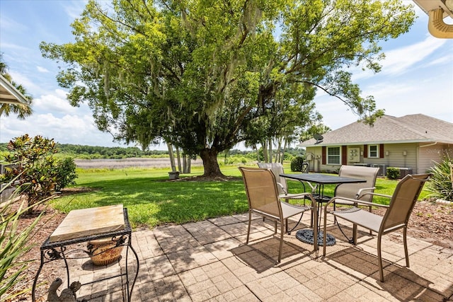 1146 Villa Ln Unit 101, Apopka, FL 32712 - view of patio featuring outdoor dining area