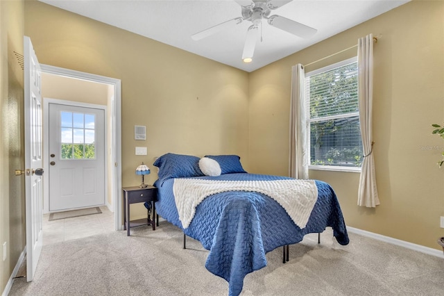 1017 Parkside Pointe Blvd, Apopka, FL 32712 - bedroom with carpet, baseboards, and a ceiling fan